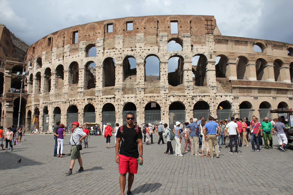 Devon in front of the Colosseum.