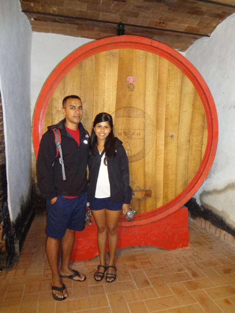 Christine and I in front of a huge wine barrel